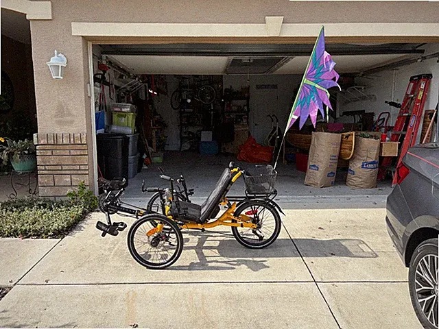Villager yellow recumbent trike with accessories. SOLD